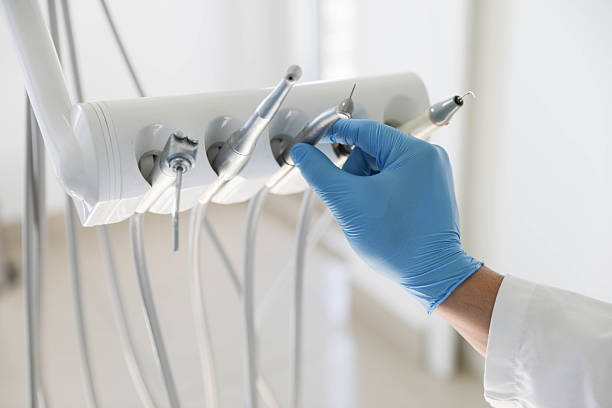 Professional Tooth Extraction technician working in Vincennes, IN